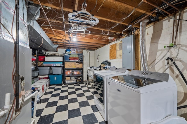 13682 Cobblestone Ln, Pickerington, OH 43147 - unfinished below grade area with washing machine and dryer, tile patterned floors, and electric panel
