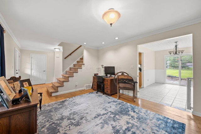 13682 Cobblestone Ln, Pickerington, OH 43147 - living area featuring wood finished floors, baseboards, crown molding, stairs, and a chandelier