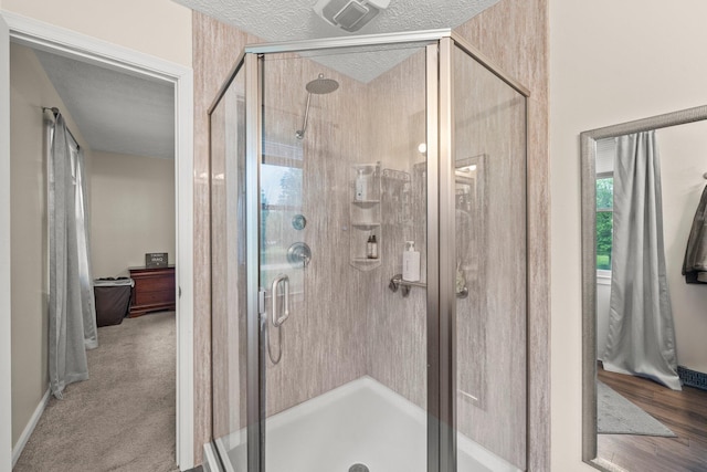 13682 Cobblestone Ln, Pickerington, OH 43147 - bathroom with a textured ceiling and a stall shower