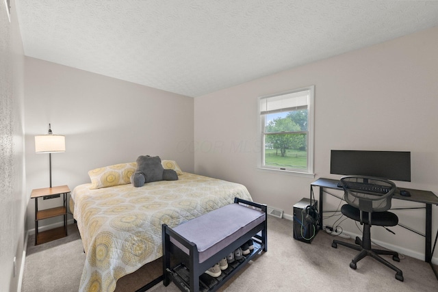 13682 Cobblestone Ln, Pickerington, OH 43147 - carpeted bedroom featuring an office area, baseboards, and a textured ceiling