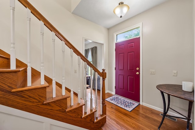 3902 Maple Grove Rd, Marion, OH 43302 - entrance foyer featuring wood finished floors, stairs, and baseboards