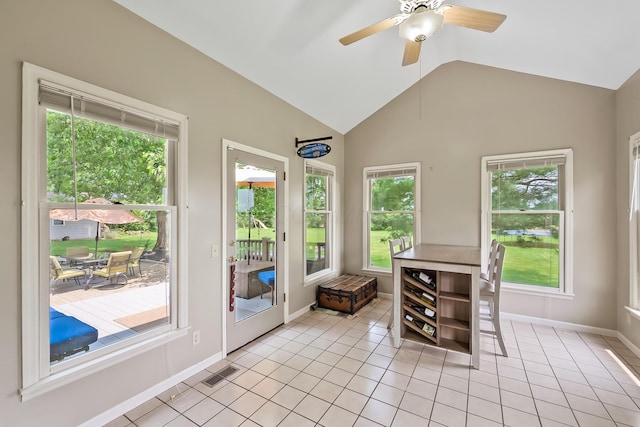 3902 Maple Grove Rd, Marion, OH 43302 - dining area featuring lofted ceiling, light tile patterned floors, a ceiling fan, and baseboards