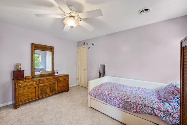 3902 Maple Grove Rd, Marion, OH 43302 - bedroom with light carpet, baseboards, and a ceiling fan