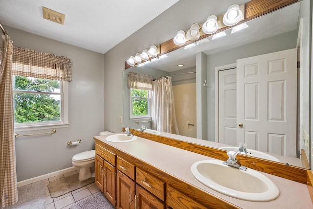 3902 Maple Grove Rd, Marion, OH 43302 - bathroom with tile patterned floors, toilet, double vanity, baseboards, and a shower with curtain