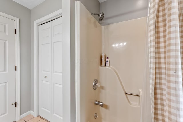 3902 Maple Grove Rd, Marion, OH 43302 - full bath featuring shower / bath combo, a closet, tile patterned flooring, and baseboards