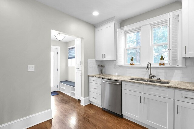 1450 Haines Ave, Columbus, OH 43212 - kitchen featuring dishwasher, a sink, baseboards, decorative backsplash, and recessed lighting