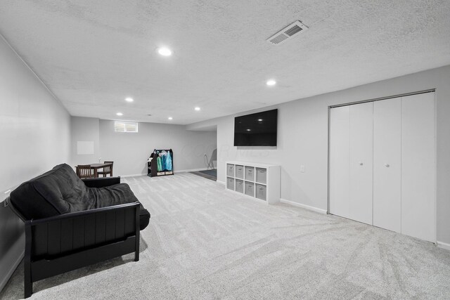 3567 Rochfort Bridge Dr, Columbus, OH 43221 - sitting room with carpet flooring, recessed lighting, baseboards, and a textured ceiling
