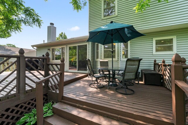 3567 Rochfort Bridge Dr, Columbus, OH 43221 - wooden terrace with outdoor dining space