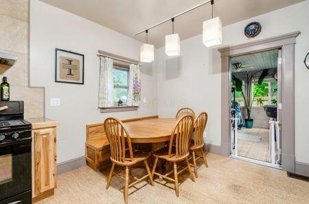 7050 Motts Place Rd, Canal Winchester, OH 43110 - dining area with baseboards and light wood-style floors