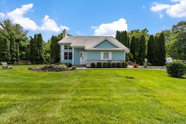 1205 Holton Rd, Grove City, OH 43123 - view of front of home featuring a chimney and a front yard