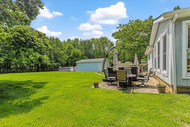 1205 Holton Rd, Grove City, OH 43123 - view of grassy yard with a patio area