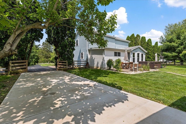 1205 Holton Rd, Grove City, OH 43123 - view of front of home featuring a hot tub, a front lawn, and a patio area