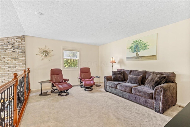 1205 Holton Rd, Grove City, OH 43123 - living area with carpet floors, a textured ceiling, and baseboards