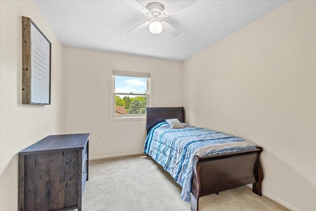 1205 Holton Rd, Grove City, OH 43123 - bedroom featuring carpet, a textured ceiling, baseboards, and a ceiling fan
