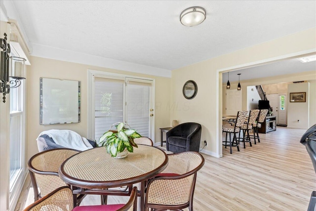 1205 Holton Rd, Grove City, OH 43123 - dining area with baseboards and light wood-style floors