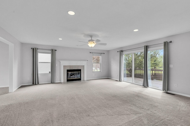 9302 Pimlico Pl, Pickerington, OH 43147 - unfurnished living room with ceiling fan, baseboards, carpet, recessed lighting, and a fireplace