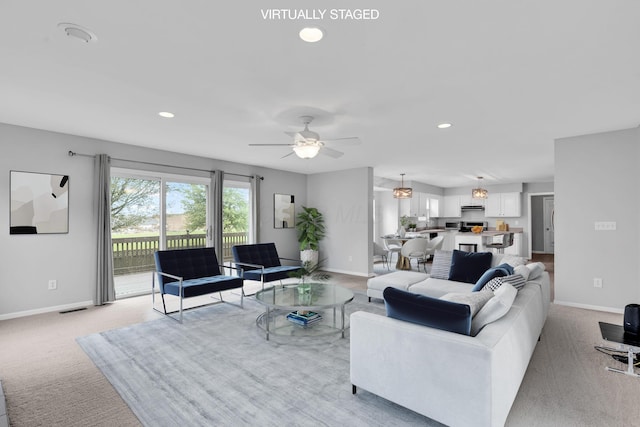 9302 Pimlico Pl, Pickerington, OH 43147 - living room featuring baseboards, light colored carpet, recessed lighting, and a ceiling fan