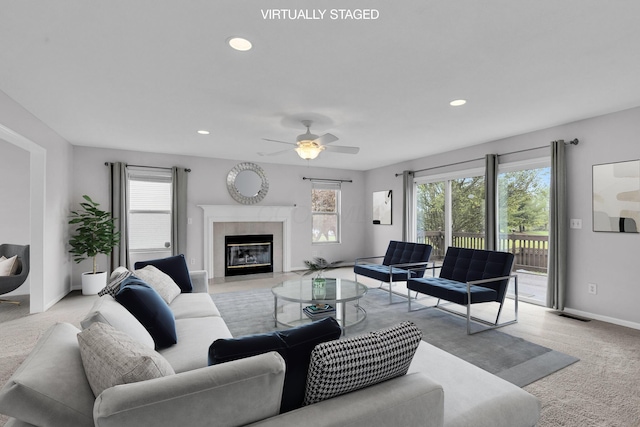 9302 Pimlico Pl, Pickerington, OH 43147 - living room featuring light carpet, baseboards, a high end fireplace, recessed lighting, and a ceiling fan