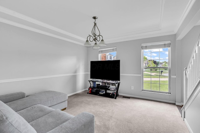9302 Pimlico Pl, Pickerington, OH 43147 - carpeted living room featuring ornamental molding, baseboards, and a chandelier