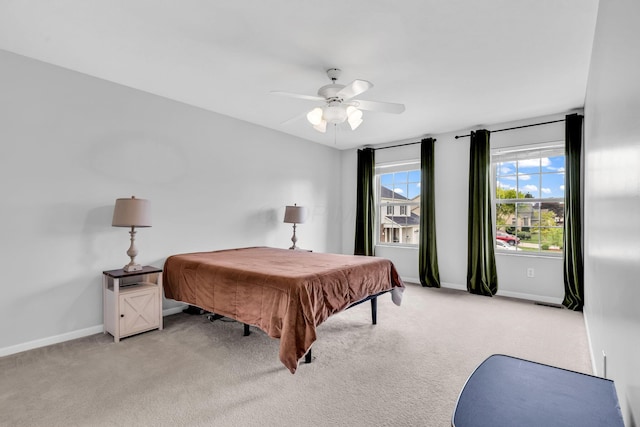 9302 Pimlico Pl, Pickerington, OH 43147 - bedroom with light carpet, baseboards, and a ceiling fan