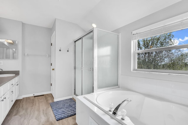 9302 Pimlico Pl, Pickerington, OH 43147 - bathroom featuring vanity, a shower stall, a bath, and lofted ceiling