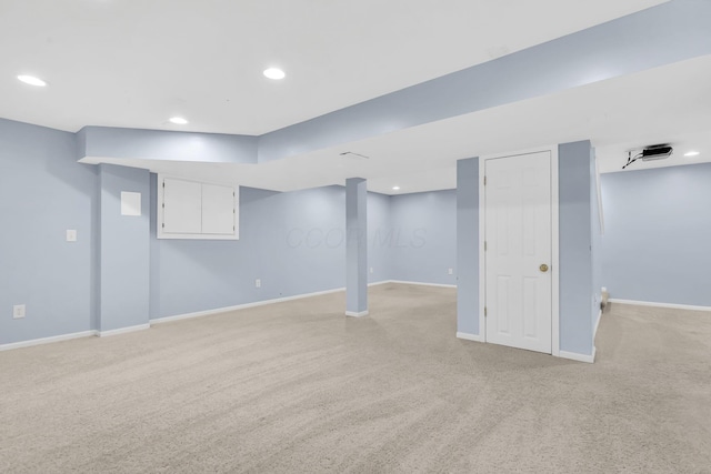 9302 Pimlico Pl, Pickerington, OH 43147 - finished below grade area with light colored carpet, baseboards, and recessed lighting