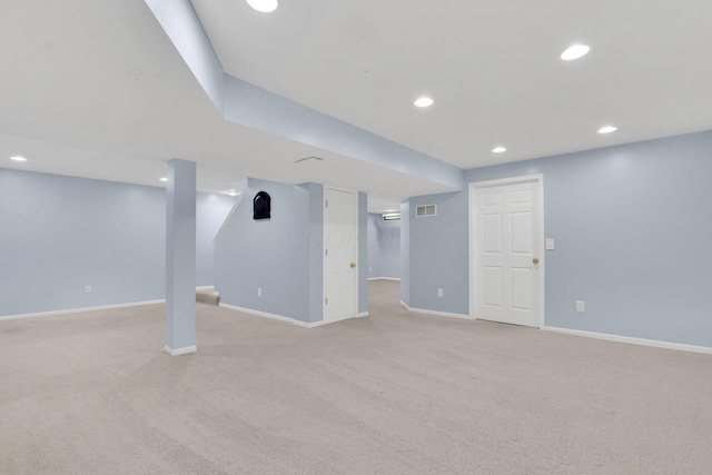 9302 Pimlico Pl, Pickerington, OH 43147 - finished below grade area with light colored carpet, baseboards, and recessed lighting