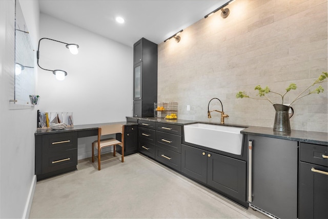 3226 Bean Oller Rd, Delaware, OH 43015 - bathroom with a sink, baseboards, and finished concrete flooring