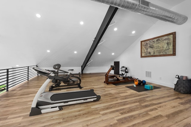 3226 Bean Oller Rd, Delaware, OH 43015 - workout area featuring lofted ceiling, wood finished floors, recessed lighting, and baseboards