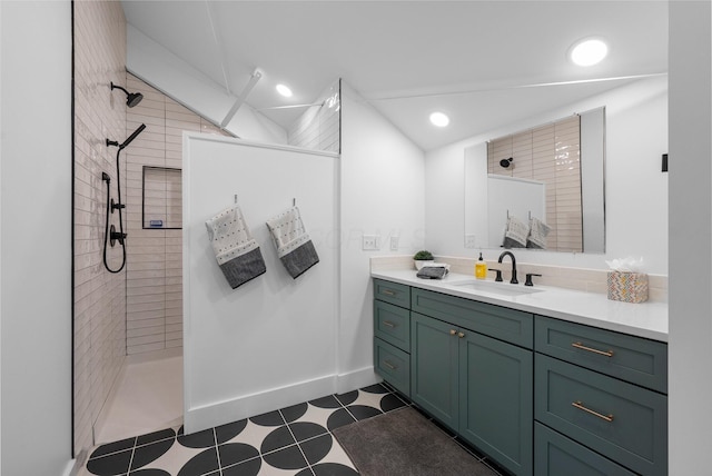 3226 Bean Oller Rd, Delaware, OH 43015 - full bath featuring vanity, walk in shower, tile patterned flooring, baseboards, and recessed lighting