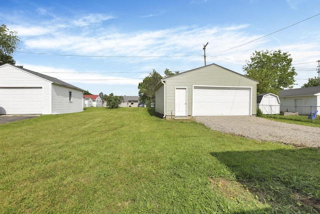46 S 24th St, Newark, OH 43055 - view of green lawn with an outbuilding and a garage