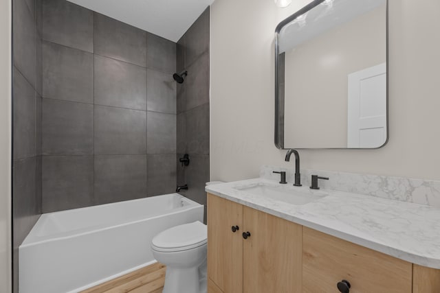 13567 Magers Rd, Howard, OH 43028 - full bathroom featuring wood finished floors, vanity, toilet, and tub / shower combination