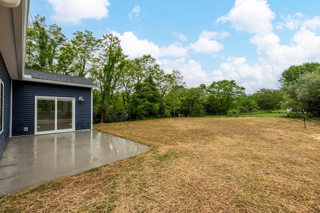 13567 Magers Rd, Howard, OH 43028 - view of green lawn featuring a patio area