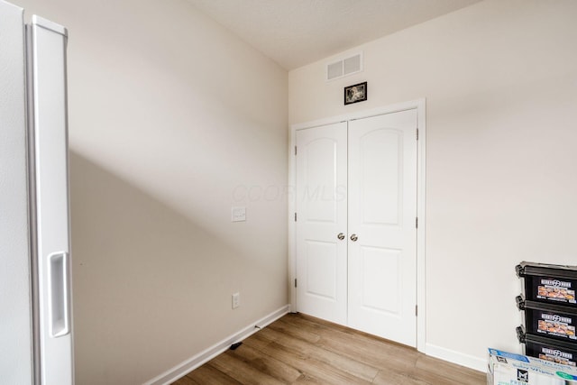 99 Hutchison St, South Bloomfield, OH 43103 - unfurnished bedroom with light wood-style floors and a closet