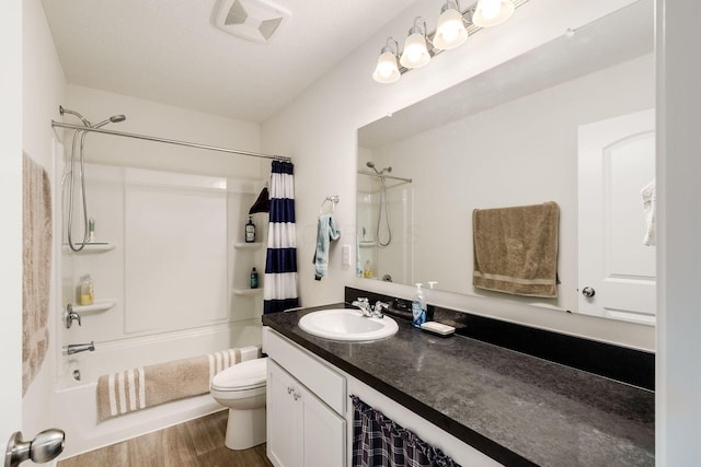 99 Hutchison St, South Bloomfield, OH 43103 - full bathroom with shower / tub combo with curtain, vanity, and wood finished floors