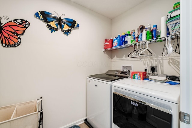 99 Hutchison St, South Bloomfield, OH 43103 - laundry room featuring separate washer and dryer and baseboards