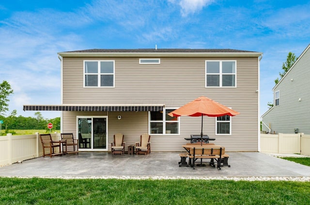 99 Hutchison St, South Bloomfield, OH 43103 - back of property with a fenced backyard and a patio area