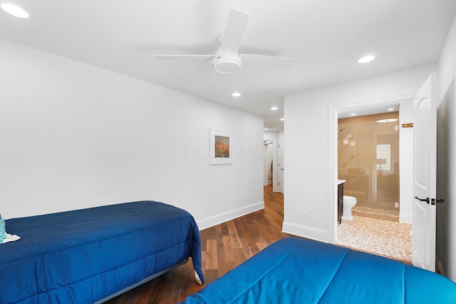 5633 Travis Pointe Ct, Westerville, OH 43082 - bedroom with wood finished floors, recessed lighting, baseboards, connected bathroom, and ceiling fan