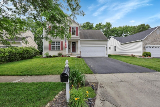 5035 Dietrich Ave, Orient, OH 43146 - traditional-style house with asphalt driveway, a front yard, and a garage