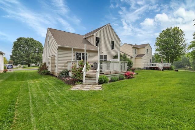 5035 Dietrich Ave, Orient, OH 43146 - back of property with a deck, a yard, and a shingled roof