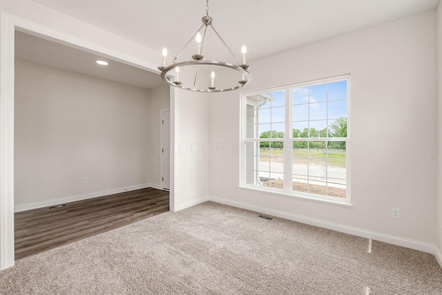 7014 Aster Way, Plain City, OH 43064 - carpeted empty room featuring a chandelier, baseboards, and recessed lighting
