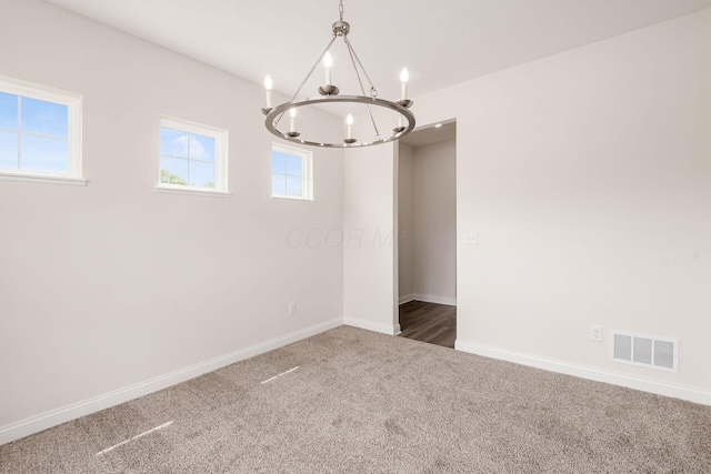 7014 Aster Way, Plain City, OH 43064 - carpeted empty room featuring a chandelier and baseboards