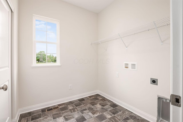 7014 Aster Way, Plain City, OH 43064 - washroom featuring electric dryer hookup, hookup for a washing machine, baseboards, and stone finish flooring