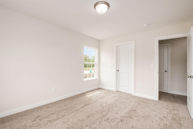 7014 Aster Way, Plain City, OH 43064 - unfurnished bedroom with carpet floors and baseboards