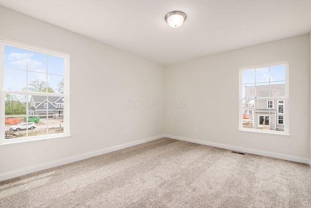 7014 Aster Way, Plain City, OH 43064 - carpeted empty room with baseboards