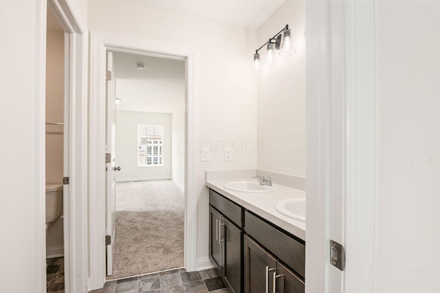7014 Aster Way, Plain City, OH 43064 - full bathroom featuring double vanity, baseboards, and toilet