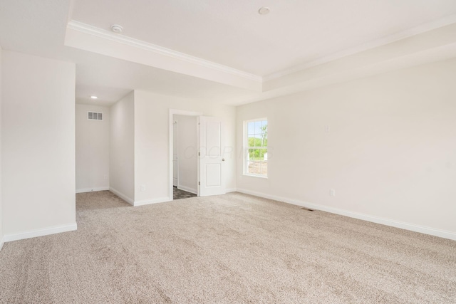 7014 Aster Way, Plain City, OH 43064 - carpeted spare room featuring ornamental molding, a tray ceiling, baseboards, and a smoke detector