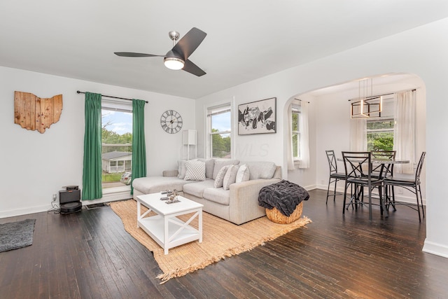 12 E Vine St, Jackson, OH 45640 - living area with arched walkways, hardwood / wood-style floors, and plenty of natural light
