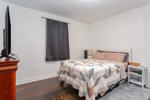 12 E Vine St, Jackson, OH 45640 - bedroom featuring baseboards and wood finished floors