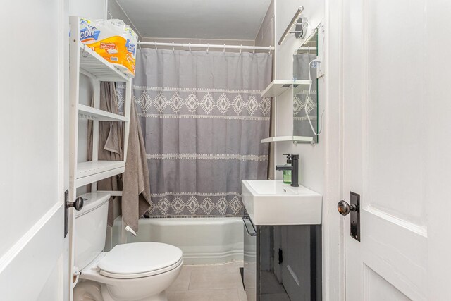 12 E Vine St, Jackson, OH 45640 - full bath with toilet, vanity, tile patterned flooring, and shower / bathtub combination with curtain